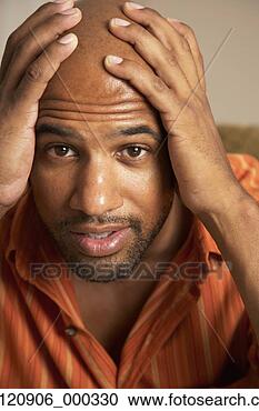 Stock Photography - mixed race man 
with hands on 
head. fotosearch 
- search stock 
photos, pictures, 
images, and photo 
clipart
