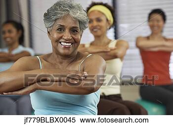 Stock Image - multi-ethnic women 
in exercise class. 
fotosearch - search 
stock photos, 
pictures, images, 
and photo clipart