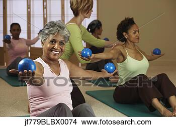 Stock Photo - multi-ethnic women 
in exercise class. 
fotosearch - search 
stock photos, 
pictures, images, 
and photo clipart