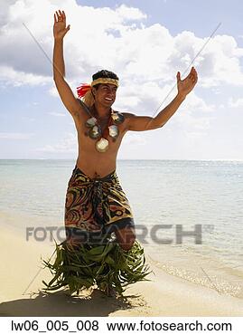 Stock Photo - pacific islander 
man in traditional 
dress on beach. 
fotosearch - search 
stock photos, 
pictures, images, 
and photo clipart