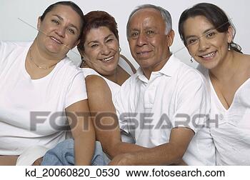 Stock Photography - portrait of hispanic 
parents and adult 
daughters. fotosearch 
- search stock 
photos, pictures, 
images, and photo 
clipart