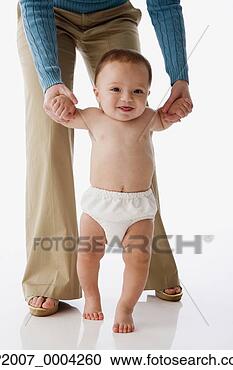 Stock Photography - russian mother 
helping baby walk. 
fotosearch - search 
stock photos, 
pictures, images, 
and photo clipart