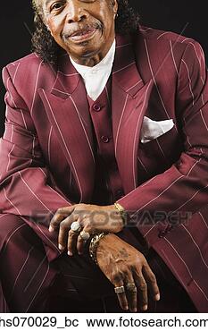 Stock Photography - senior african 
man wearing suit. 
fotosearch - search 
stock photos, 
pictures, images, 
and photo clipart