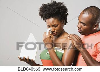 Stock Photo - african american 
man comforting 
crying girlfriend. 
fotosearch - search 
stock photos, 
pictures, images, 
and photo clipart
