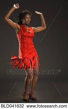 Stock Photo - african american 
woman dancing. 
fotosearch - search 
stock photos, 
pictures, images, 
and photo clipart