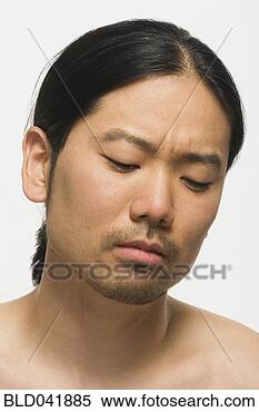 Stock Image - asian man looking 
down. fotosearch 
- search stock 
photos, pictures, 
images, and photo 
clipart