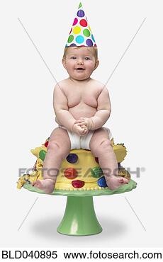 Stock Image - baby sitting on <br>birthday cake. <br>fotosearch - search <br>stock photos, <br>pictures, images, <br>and photo clipart