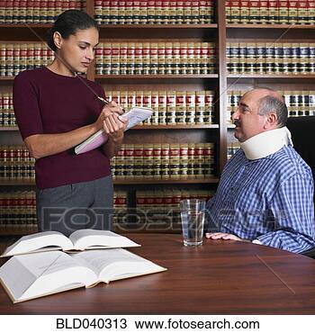Stock Photo - female lawyer 
talking to injured 
client. fotosearch 
- search stock 
photos, pictures, 
images, and photo 
clipart