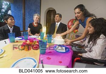 Stock Image - hispanic girl 
celebrating birthday 
with family. fotosearch 
- search stock 
photos, pictures, 
images, and photo 
clipart