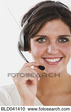 Stock Photography - mixed race businesswoman 
wearing headset. 
fotosearch - search 
stock photos, 
pictures, images, 
and photo clipart