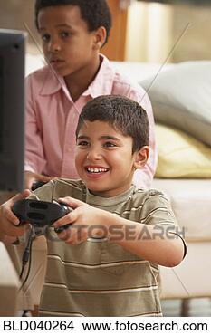 Stock Photo - multi-ethnic boys 
playing video 
games. fotosearch 
- search stock 
photos, pictures, 
images, and photo 
clipart