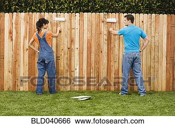 Stock Photo - multi-ethnic couple 
painting fence. 
fotosearch - search 
stock photos, 
pictures, images, 
and photo clipart