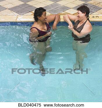 Stock Image - multi-ethnic senior 
women in swimming 
pool. fotosearch 
- search stock 
photos, pictures, 
images, and photo 
clipart