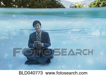Stock Photo - south american 
businessman in 
swimming pool. 
fotosearch - search 
stock photos, 
pictures, images, 
and photo clipart