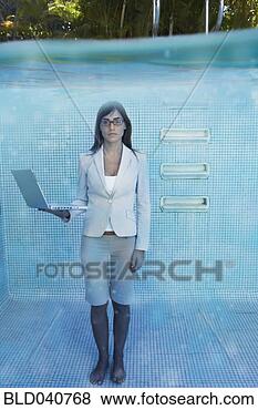Stock Photo - south american 
businesswoman 
in swimming pool. 
fotosearch - search 
stock photos, 
pictures, images, 
and photo clipart
