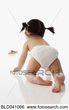 Stock Photo - studio shot of 
asian baby crawling. 
fotosearch - search 
stock photos, 
pictures, images, 
and photo clipart