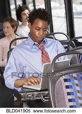 Stock Image - african american 
businessman typing 
on laptop. fotosearch 
- search stock 
photos, pictures, 
images, and photo 
clipart