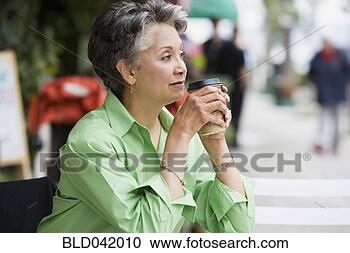 Stock Photography - african american 
woman drinking 
coffee. fotosearch 
- search stock 
photos, pictures, 
images, and photo 
clipart