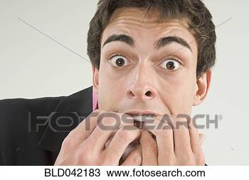 Stock Photo - businessman with 
fingers in mouth. 
fotosearch - search 
stock photos, 
pictures, images, 
and photo clipart