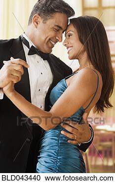 Stock Photography - hispanic couple 
dancing in eveningwear. 
fotosearch - search 
stock photos, 
pictures, images, 
and photo clipart