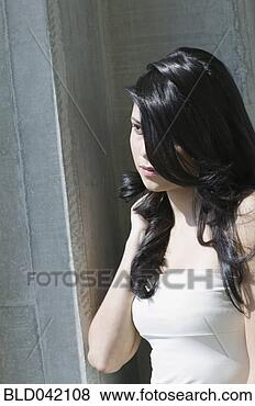 Stock Photo - hispanic woman 
with long hair. 
fotosearch - search 
stock photos, 
pictures, images, 
and photo clipart