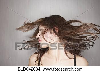 Stock Photo - middle eastern 
woman swinging 
hair. fotosearch 
- search stock 
photos, pictures, 
images, and photo 
clipart