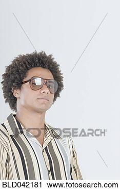 Stock Photography - mixed race man 
wearing sunglasses. 
fotosearch - search 
stock photos, 
pictures, images, 
and photo clipart