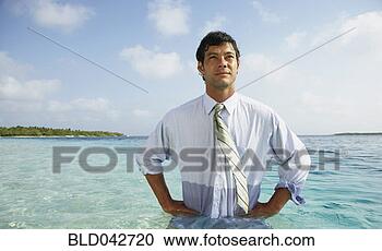 Stock Photography - south american 
businessman in 
water. fotosearch 
- search stock 
photos, pictures, 
images, and photo 
clipart
