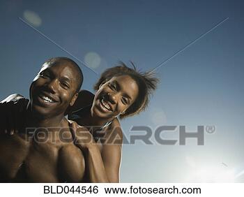 Stock Photo - african american 
couple hugging. 
fotosearch - search 
stock photos, 
pictures, images, 
and photo clipart