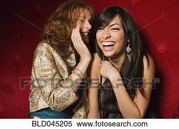 Stock Image - ethnic-ethnic 
women telling 
secret. fotosearch 
- search stock 
photos, pictures, 
images, and photo 
clipart