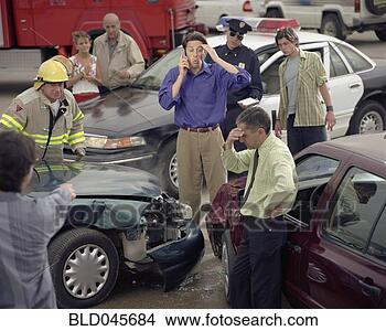 Stock Photo - hispanic man talking 
on cell phone 
at accident scene. 
fotosearch - search 
stock photos, 
pictures, images, 
and photo clipart