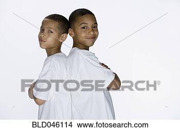 Stock Photo - african american 
brothers standing 
back to back. 
fotosearch - search 
stock photos, 
pictures, images, 
and photo clipart