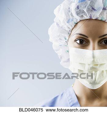 Stock Image - african american 
female medial 
professional wearing 
surgical mask. 
fotosearch - search 
stock photos, 
pictures, images, 
and photo clipart