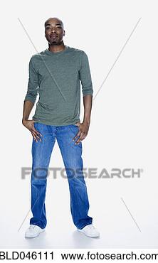 Stock Photography - african american 
man with thumbs 
in pockets. fotosearch 
- search stock 
photos, pictures, 
images, and photo 
clipart