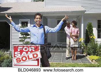 American Real Estate on Stock Photo Of African American Real Estate Agent And Couple In Front