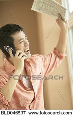 Picture - asian man talking 
on cell phone. 
fotosearch - search 
stock photos, 
pictures, images, 
and photo clipart