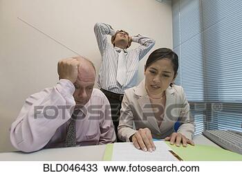Stock Photo - group of frustrated 
multi-ethnic businesspeople. 
fotosearch - search 
stock photos, 
pictures, images, 
and photo clipart