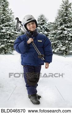 Stock Photography - mixed race boy 
holding ski poles. 
fotosearch - search 
stock photos, 
pictures, images, 
and photo clipart