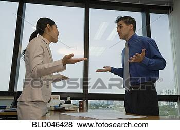 Stock Photo - multi-ethnic businesspeople 
arguing. fotosearch 
- search stock 
photos, pictures, 
images, and photo 
clipart