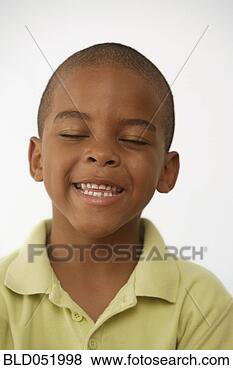 Stock Photo - african american 
boy with eyes 
closed. fotosearch 
- search stock 
photos, pictures, 
images, and photo 
clipart