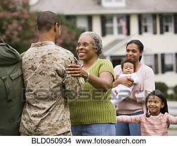 Stock Photo - african american 
male soldier greeting 
family. fotosearch 
- search stock 
photos, pictures, 
images, and photo 
clipart