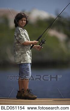 Stock Photo - hispanic boy fishing 
on pier. fotosearch 
- search stock 
photos, pictures, 
images, and photo 
clipart