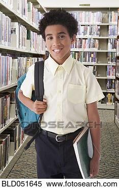 Stock Image - hispanic boy holding 
backpack. fotosearch 
- search stock 
photos, pictures, 
images, and photo 
clipart