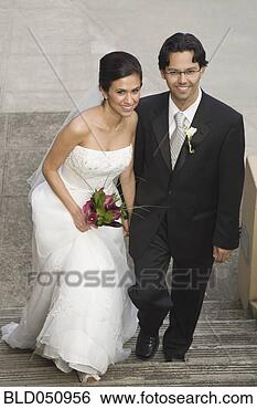 Stock Photo - hispanic bride 
and groom on steps. 
fotosearch - search 
stock photos, 
pictures, images, 
and photo clipart