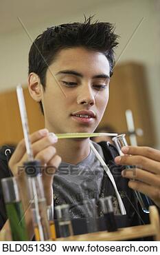 Stock Photography - hispanic teenaged 
boy in science 
class. fotosearch 
- search stock 
photos, pictures, 
images, and photo 
clipart