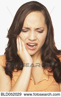 Stock Photograph - hispanic woman 
with toothache. 
fotosearch - search 
stock photos, 
pictures, images, 
and photo clipart