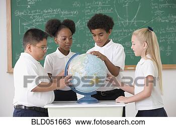 Stock Photo - multi-ethnic children 
looking at classroom 
globe. fotosearch 
- search stock 
photos, pictures, 
images, and photo 
clipart
