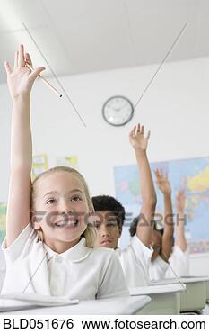 Stock Photo - multi-ethnic children 
raising hands 
in class. fotosearch 
- search stock 
photos, pictures, 
images, and photo 
clipart
