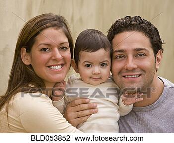 Stock Photo - hispanic parents 
hugging baby. 
fotosearch - search 
stock photos, 
pictures, images, 
and photo clipart