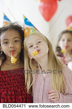 Stock Photography - multi-ethnic girls  at birthday party.  fotosearch - search  stock photos,  pictures, images,  and photo clipart